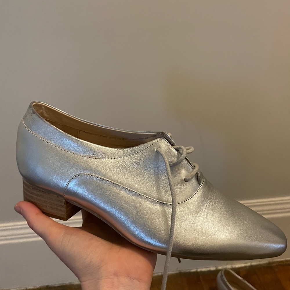 super cute Intentionally Blank silver shoes